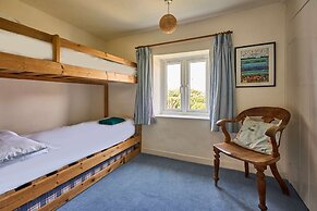 Host Stay Teal Cottage