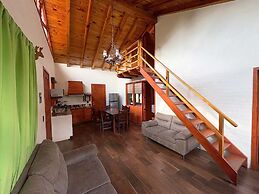 Paseo del Llano Cabañas & Suites