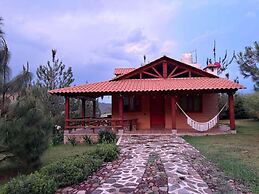 Paseo del Llano Cabañas & Suites