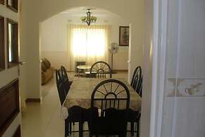 Home Up Guest House