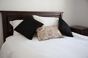 Pacific Point Market & Suites