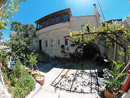 Whisper Cave House
