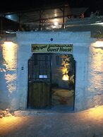 Whisper Cave House