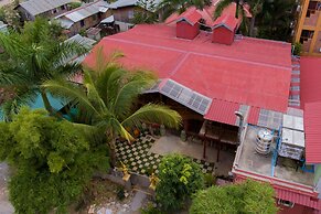 Teak Wood Hotel