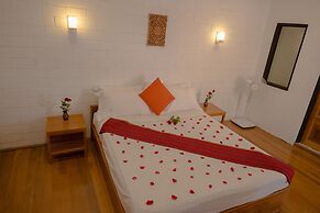 Teak Wood Hotel