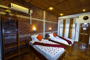 Teak Wood Hotel