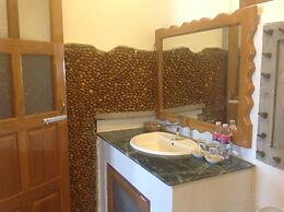Teak Wood Hotel
