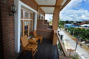 Teak Wood Hotel