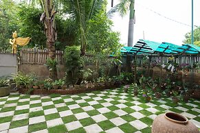 Teak Wood Hotel