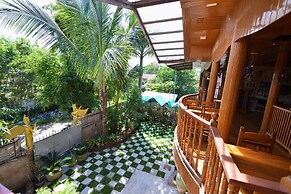 Teak Wood Hotel