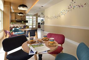 Caffir garden hotel