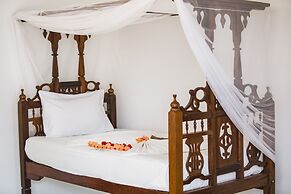 Moonshine Uroa Boutique Hotel