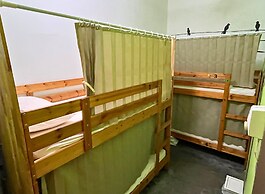 PODs The Backpackers Home & Cafe