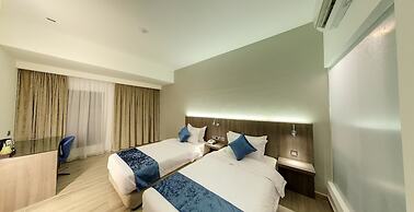 Flora by Crossroads Hotel