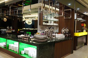Greens Hotel & Suites