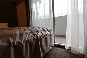 The Base Sakaihigashi Apartment Hotel