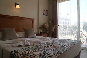 Rosy Suites Hotel