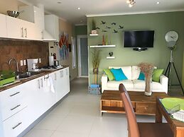 Malika Apartments