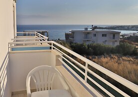 Helios Studios & Apts