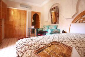 Riad Jenan Adam