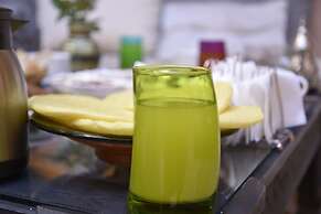 Riad Jenan Adam
