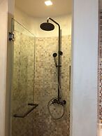 The Che Pool Access Beachfront Condo by Away