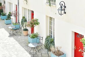 Hôtel Suites Unic Renoir Saint Germain