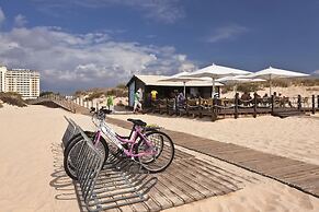 Ozadi Altura Beach Resort