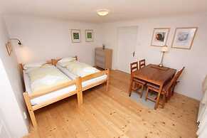 At the Golden Plough Apartments