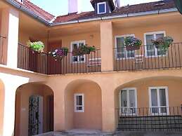 At the Golden Plough Apartments