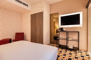 Alma Grand Place Hotel