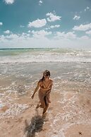 Petit Lafitte Beachfront Hotel & Bungalows
