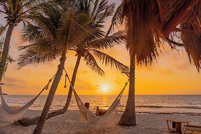 Petit Lafitte Beachfront Hotel & Bungalows