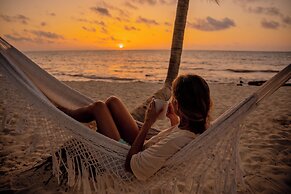 Petit Lafitte Beachfront Hotel & Bungalows