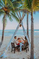 Petit Lafitte Beachfront Hotel & Bungalows