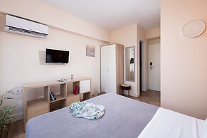 Enattica Syntagma Living