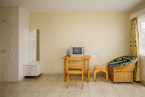 Harlequin Suites Hotel