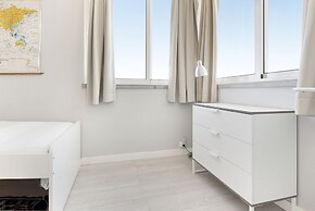 Prime Apartments White and Yellow