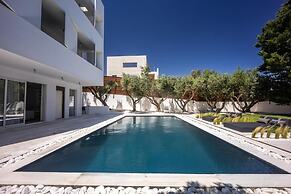 Infinity White Complex by GK Hospitality Group