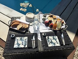 Infinity White Complex by GK Hospitality Group
