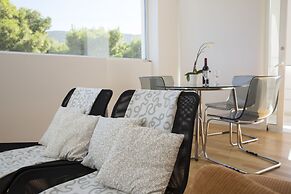 Infinity White Complex by GK Hospitality Group
