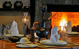 Pugdundee Safaris - Kanha Earth Lodge