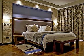 Magna Hotel and Suites