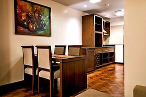 Magna Hotel and Suites