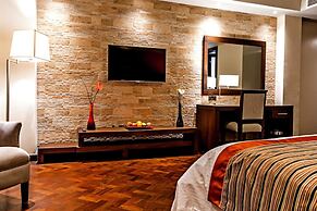 Magna Hotel and Suites