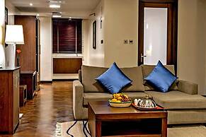 Magna Hotel and Suites