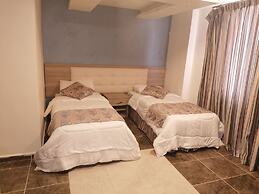 Milano Hotel Suites