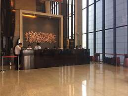 Checkinn Business Apartment-Poly World