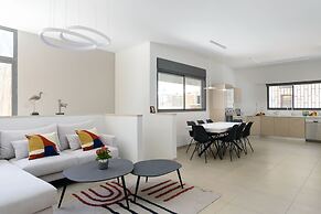 Elegant Duplex with XL Patio by FeelHome