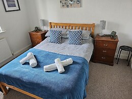 Snug - Meadhan Apartment